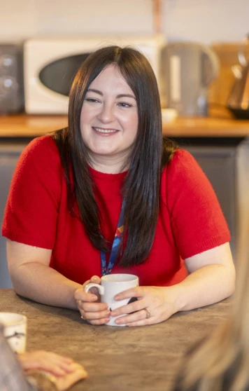 Support staff at Glasgow Kelvin College enjoying a relaxed conversation over coffee in a staff kitchen area. Support staff at Glasgow Kelvin College enjoying a relaxed conversation over coffee in a staff kitchen area.